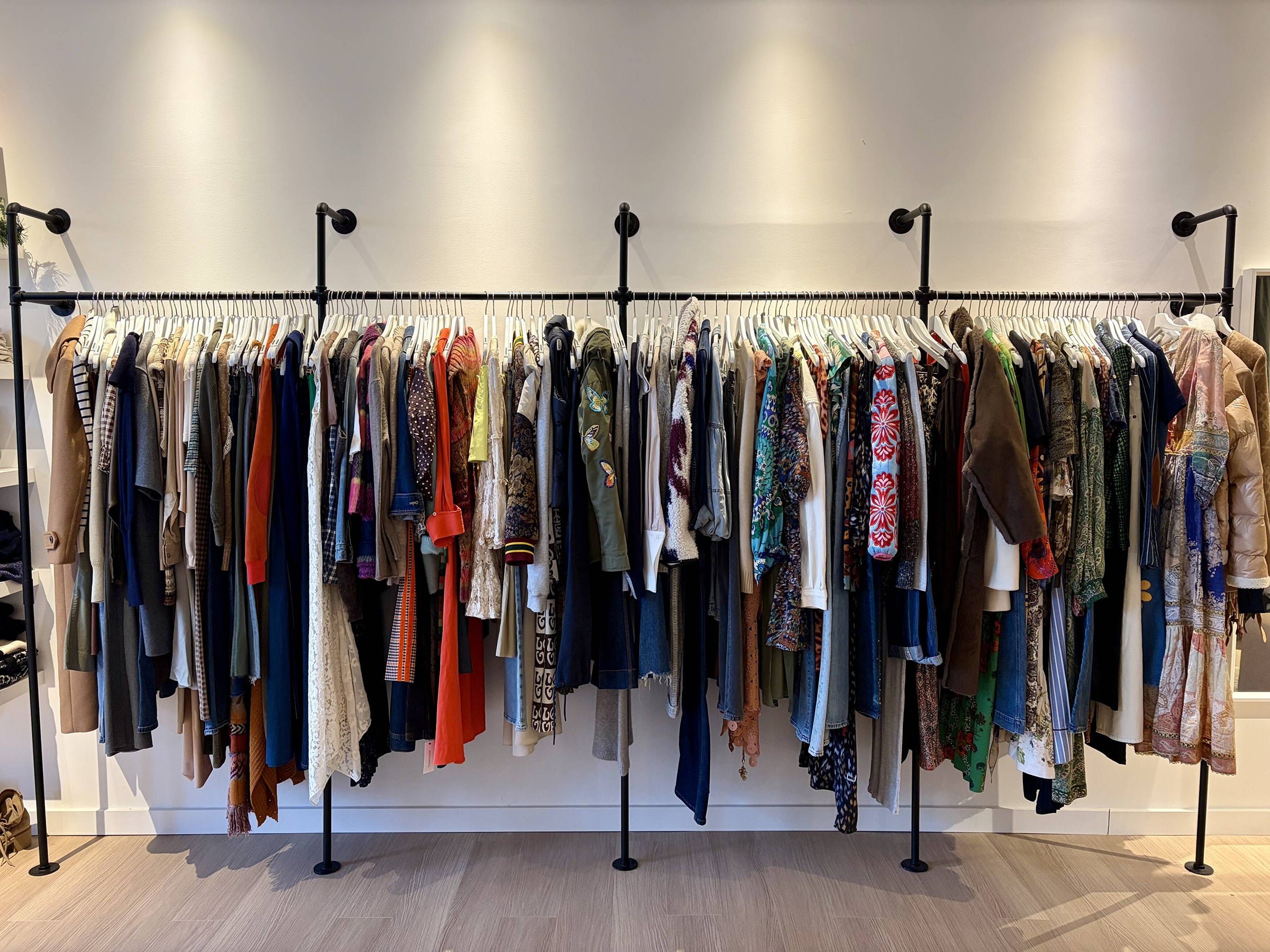 Clothing displayed on retail racks